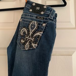 Boot cut low rise miss me jeans